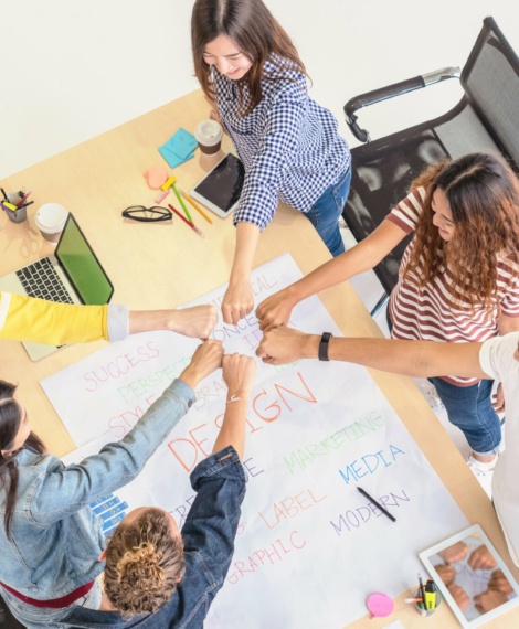 Top view scene of Asian and Multiethnic Business people with casual suit standing and Hand coordination with happy action for teamwork in the modern workplace, people business group concept