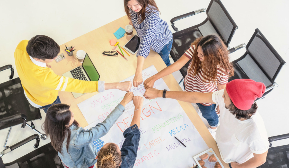Top view scene of Asian and Multiethnic Business people with casual suit standing and Hand coordination with happy action for teamwork in the modern workplace, people business group concept